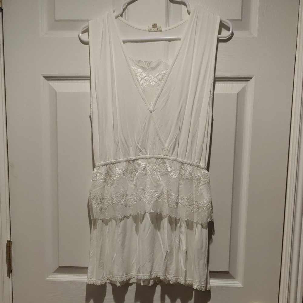 Elegant White Sleeveless Dress with Lace Details